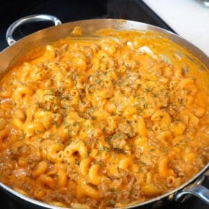 Creamy hamburger helper noodles in a pan.