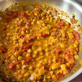 Coconut chickpea curry in a pan.