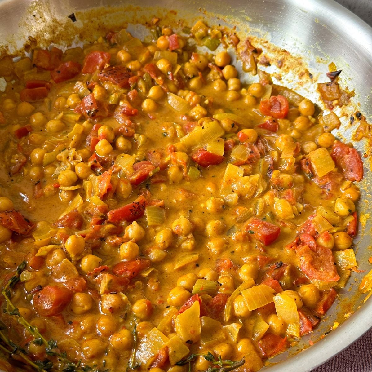 Coconut chickpea curry in a pan.