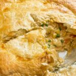 Close up of creamy chicken pot pie.