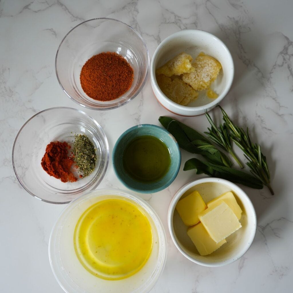 Paprika, herbs, minced garlic, butter, olive oil and honey.