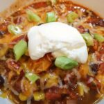Small batch vegan chili with sweet potatoes, black beans, corn, and a spicy blend of seasonings.