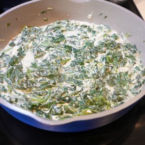 Steakhouse creamed spinach in a pan.