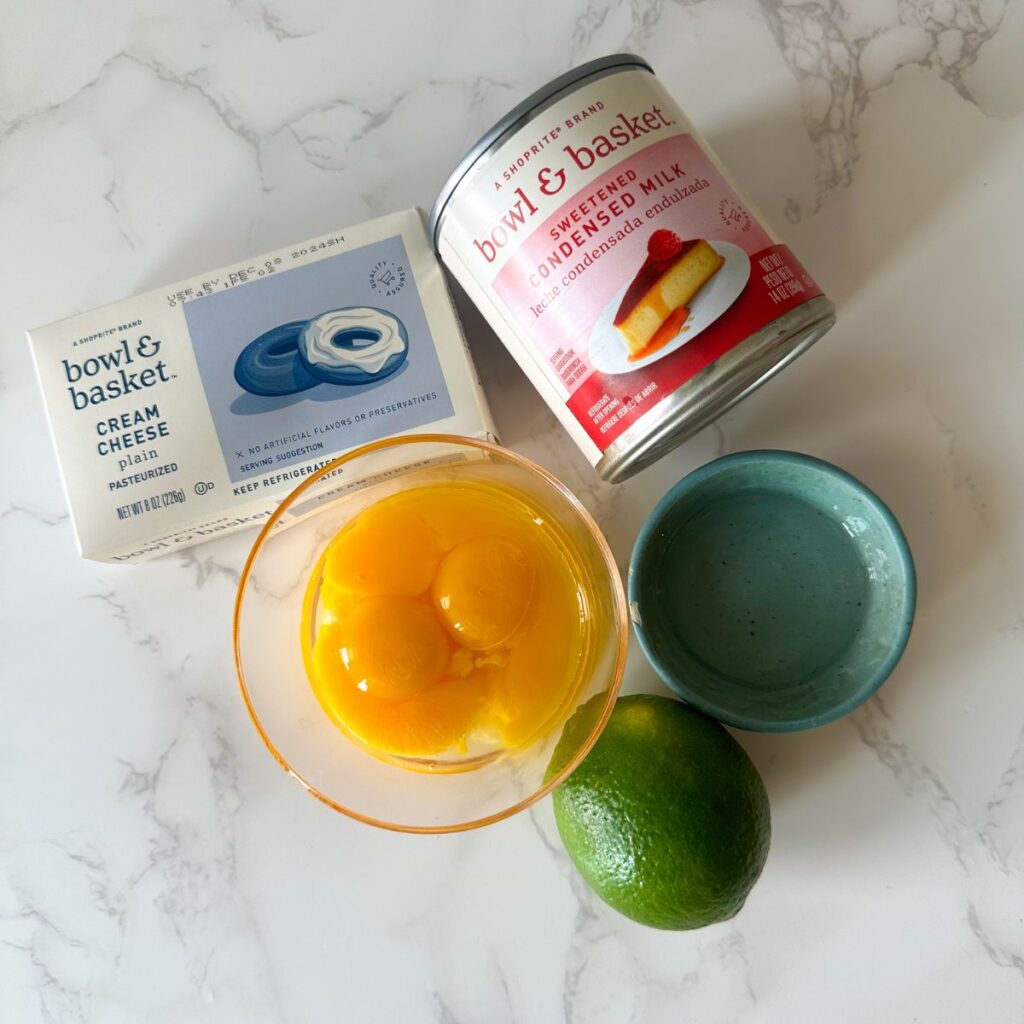 Egg yolks, lime, cream cheese and condensed milk.