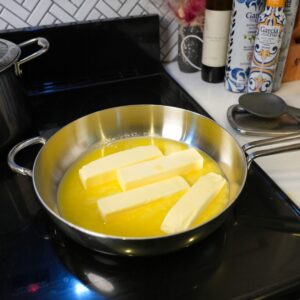 Butter melting in a pan.