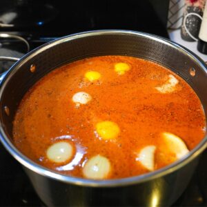 Seafood boil broth.