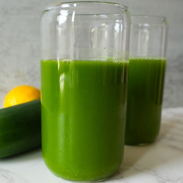Freshly pressed green juice in a glass.