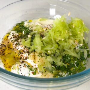 tzatziki sauce ingredients in a bowl.