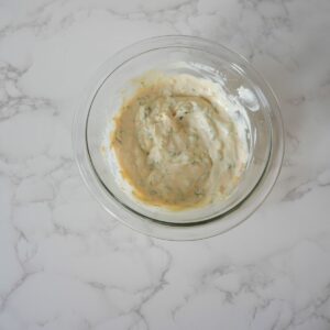 Tartar sauce in a glass bowl.