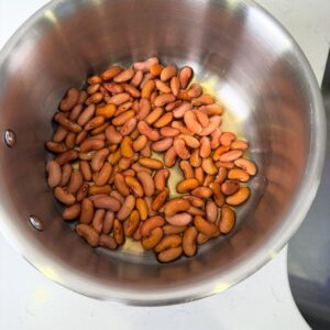 Red kidney beans soaking in water.