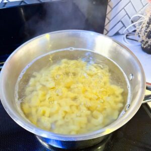 Macaroni boiling in water.