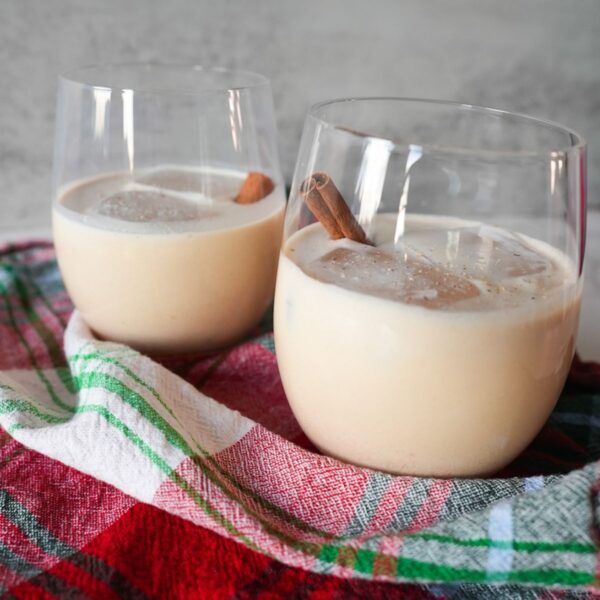 Ponche de Creme in glasses with cinnamon and nutmeg.