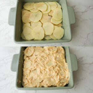 Scalloped potatoes in a baking dish with cheese sauce on top.