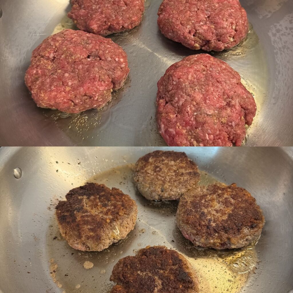 Salisbury steak patties cooking in a skillet.