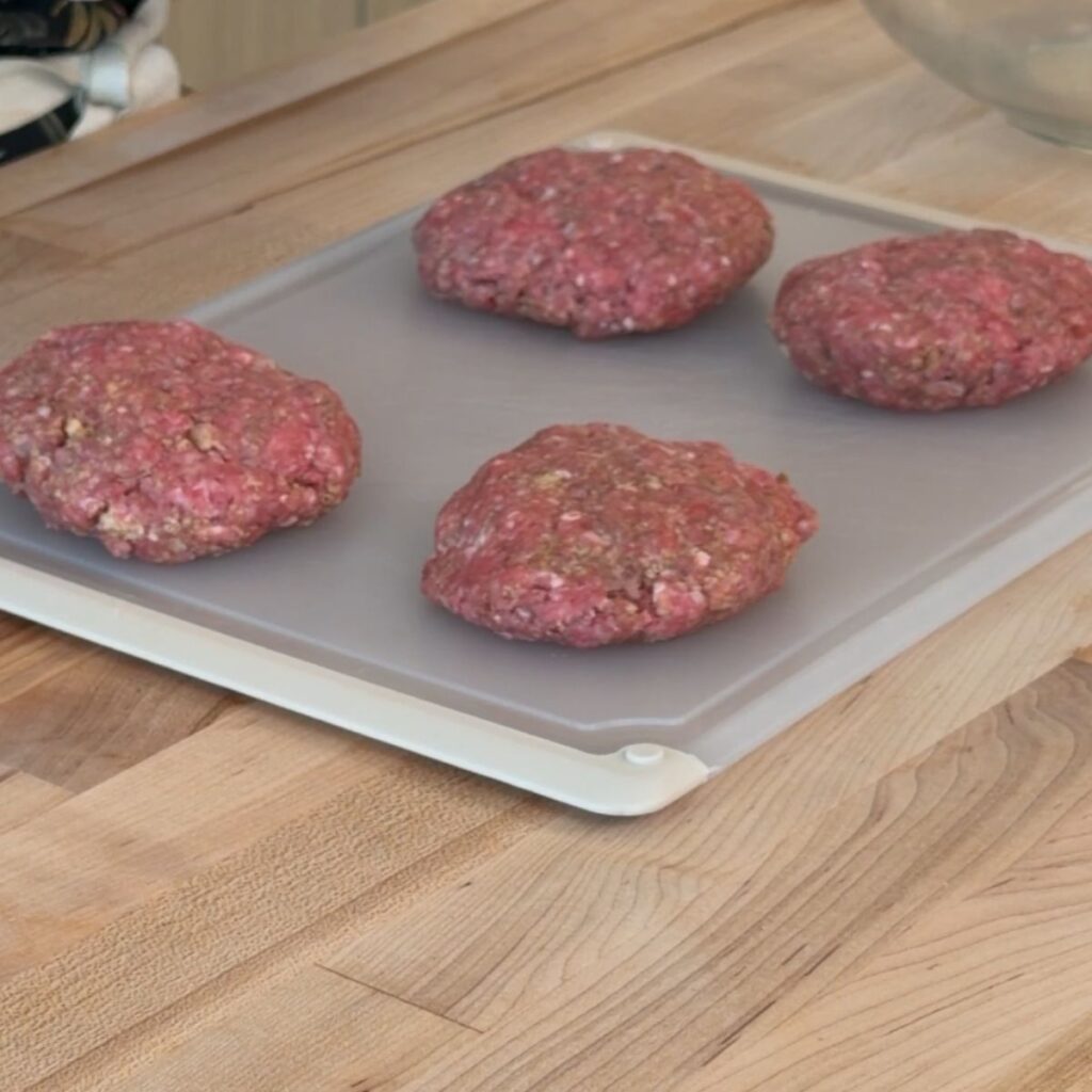 Salisbury steak patties before cooking.