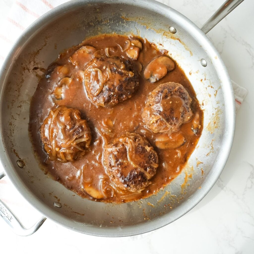 Salisbury steak patties in brown onion mushroom gravy.