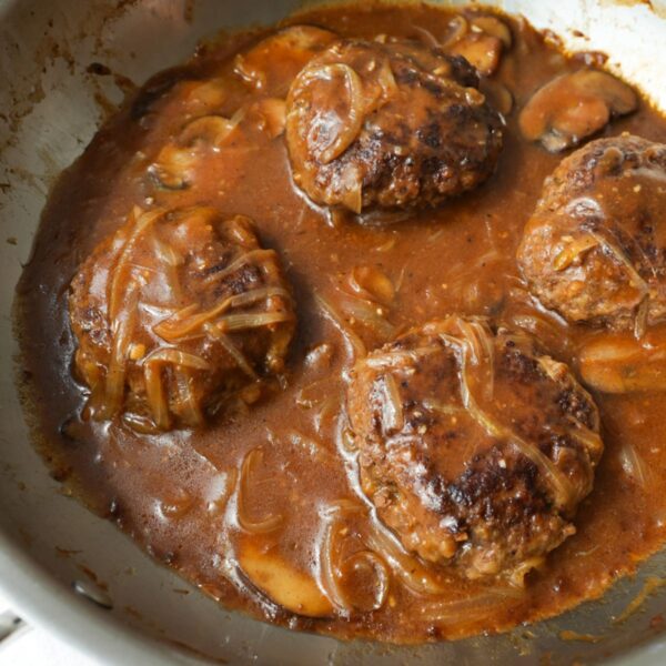 Salisbury steak patties in brown onion mushroom gravy.