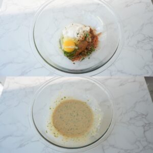 Mayo, egg, parsley and seasonings in a bowl.
