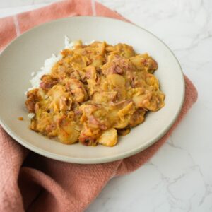 Southern Lima Beans in a bowl over white rice.