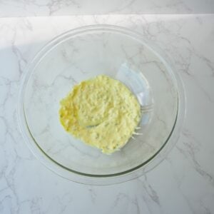 Mustard, mayo and relish mixed together in a bowl.
