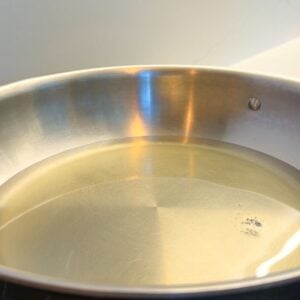 Oil in a frying pan.
