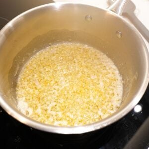 Shallots and garlic cooking in butter.