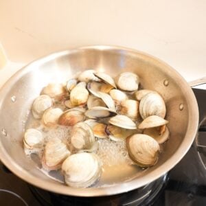 Clams cooking in white wine.