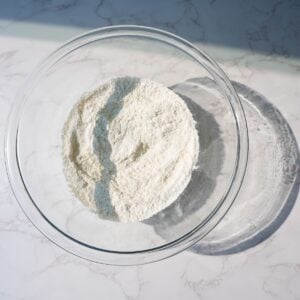 Dry ingredients for cheddar bay biscuits in a glass bowl.