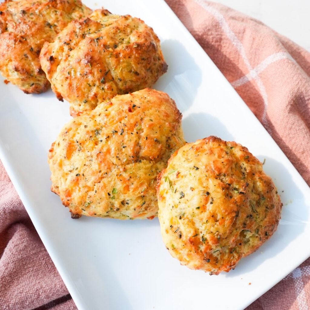 Golden cheddar bay biscuits brushed with garlic herb butter.