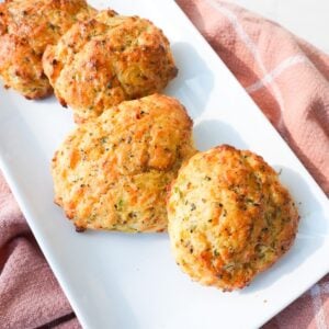 Golden cheddar bay biscuits brushed with garlic herb butter.