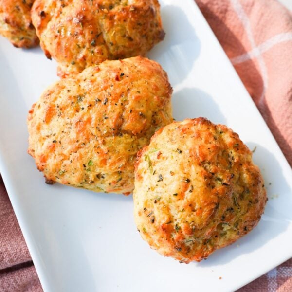 Golden cheddar bay biscuits brushed with garlic herb butter.