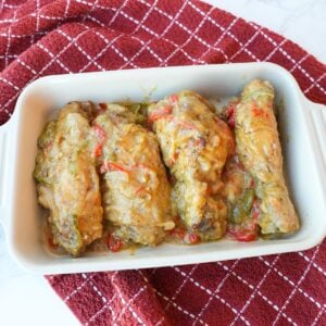 Smothered turkey wings covered in homemade gravy with sliced onions and peppers.