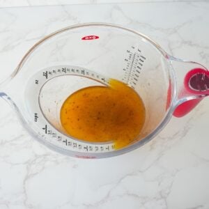 Pan drippings in a measuring cup.